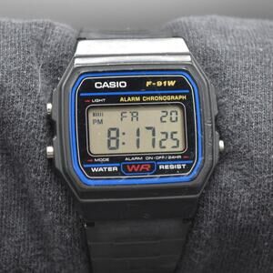 Casio F-91W Classic Digital Watch Blue Face Black LCD Chrono Alarm WORKING